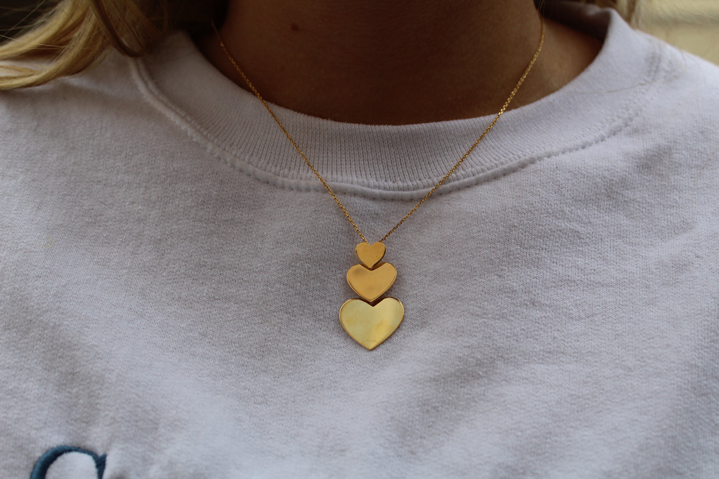 Necklace multiple gold hearts