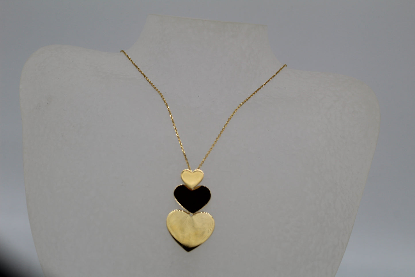 Necklace multiple gold hearts